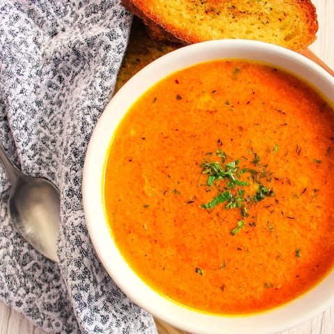 A bowl of roasted cherry tomato soup.